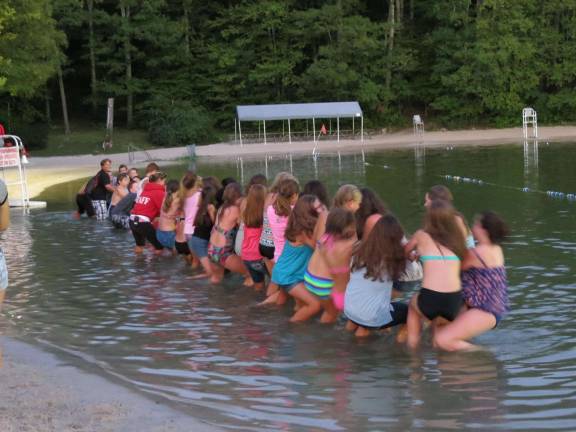 The traditional tug of war was a hit in the lake. And the girls won!