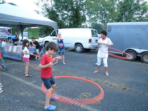 They gave it their best - and some were pretty good - at the retro Hula Hoops. What a fun way to get some exercise.