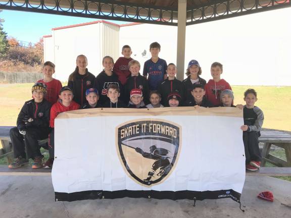 Members of the New Jersey Bandits Pee Wee 12UA team helped collect donations for Operation Thank You as well.