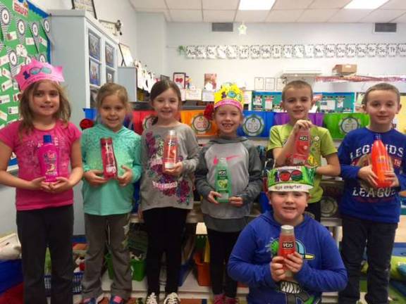 Brittany Bright's first graders were thrilled to help! Here are Alyssa, Victoria, Skylar, Lyla, Michael, James and Jameson.