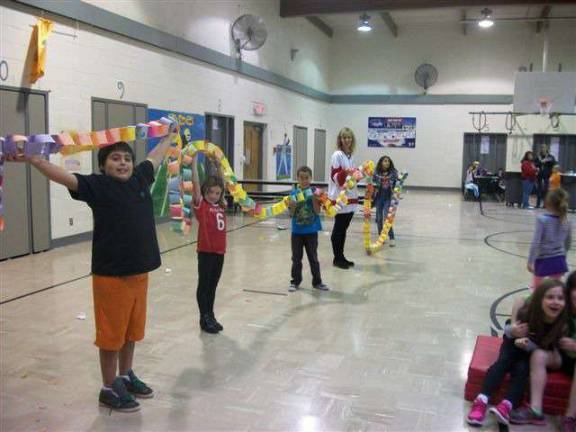 At Apshawa, a large construction paper chain connected kids.