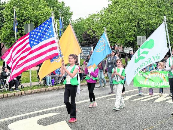 The West Milford Girl Scouts march in the parade.
