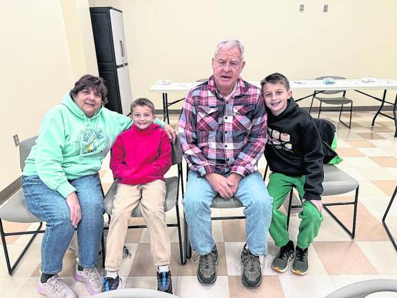 Debbie Van Bunt (grandmother); Liam Norton, age 7; Charlie Norton age 9; Mike Van Bunt ( grandfather); from Highland Lakes