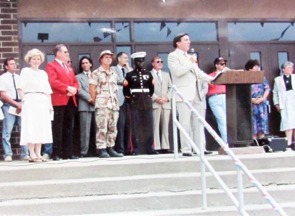 Joe Deery, founder and organizer of West Milford Pride Day, opens the program from the steps of West Milford High School in 1991.
