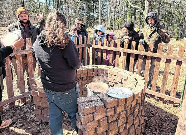 A demonstration of how maple sap is turned into maple syrup by boiling.