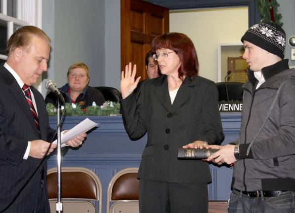 Two new council members take their oaths