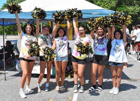 West Milford High School cheerleaders pose at the tailgate and watch party.