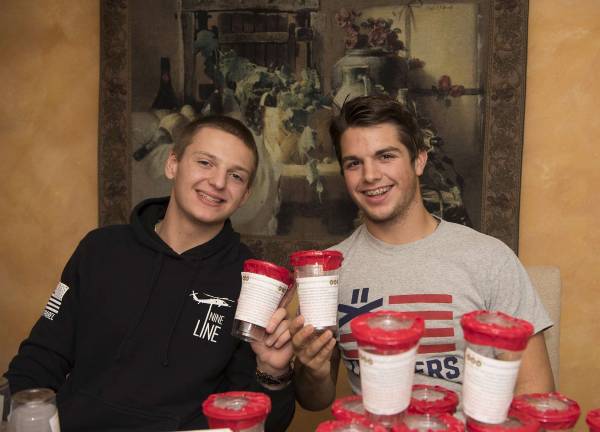 photo provided West Milford High School students Mathew Hoffman, left, and Evan LeMay have been raising money to buy wreaths for veterans' graves in Clove Cemetery in Wantage.