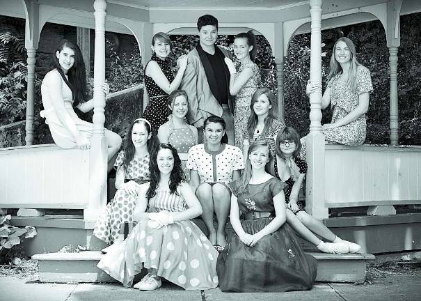 Tom Wright as Conrad Birdie and the teens of the 'Bye Bye Birdie!' cast