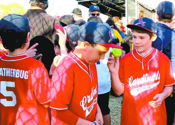 Little League's Opening Day scores big with families