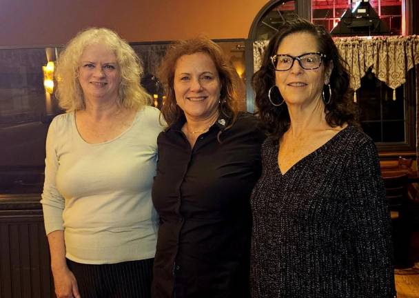 From left, Karen Phelan, Melissa Brown Blaeuer and Mary Granata wait for election results Tuesday, Nov. 7. Blaeuer ran for mayor and Phelan and Granata ran for Township Council seats as Democrats. (Photo by Rich Adamonis)