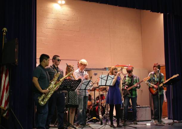 The talented local band, "The Statement" put on their own half-time show at the Saint Joseph Church Super Bowl party on Feb. 2.