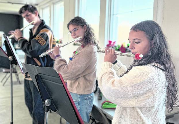 Members of the West Milford High School band perform.