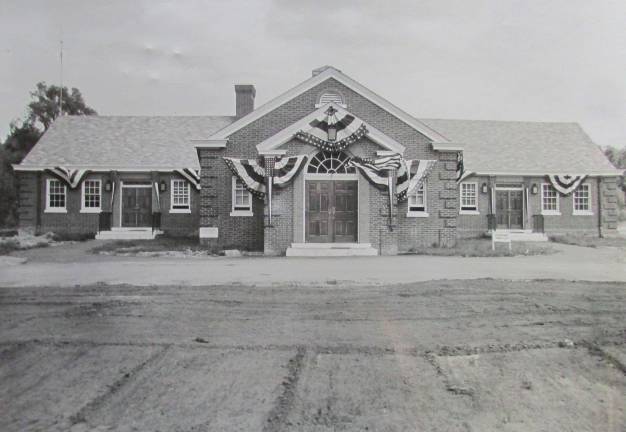 PHOTO BY ANN GENADER The West Milford Township Hall, pictured when it was built in 1957, at a cost of $135,000, did not have the two wings that are now on either side of the building.