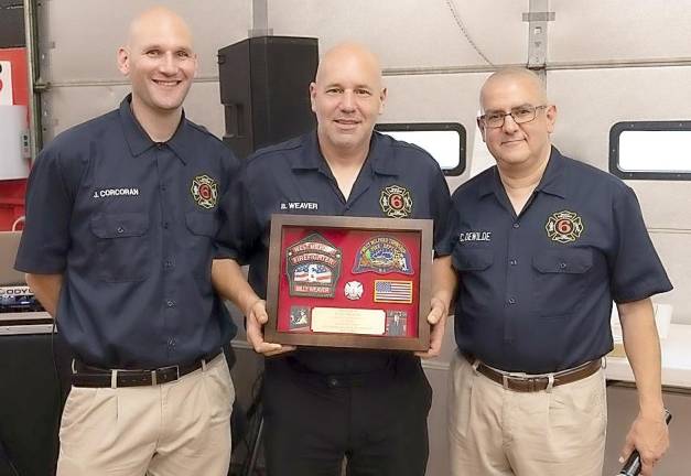 Pictured from left to right are West Milford Fire Chief Joe Corcoran, Billy Weaver and President Chris DeWilde.