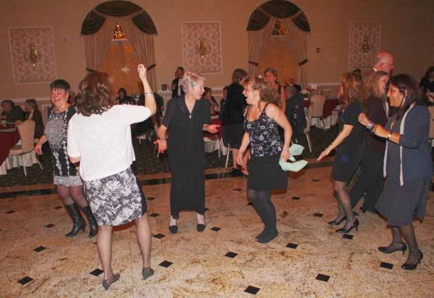 Girls just want to have fun, and that includes Sr. Janet Brisky, center, who seems to be questioning if she's got the steps down right.