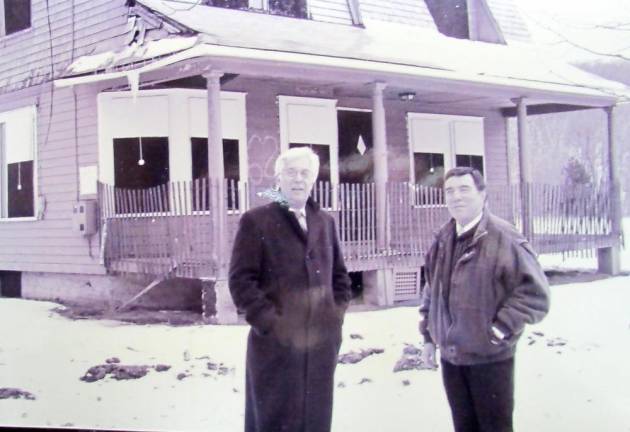 Passaic County Freeholder Richard DuHaime (left) explores the New City Community with Joe Deery (right) in their unsuccessful attempt to preserve the houses.