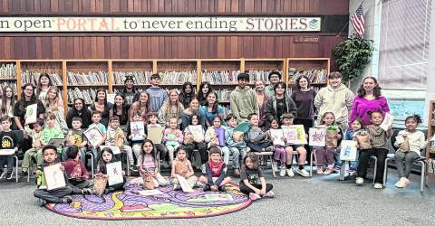 Students collaborate on ‘Monster Buddies’ art project