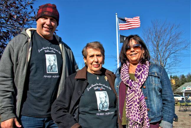 Don Webb photos George Durr (left) and his mother Adele Durr (center) both honor his father's service with matching shirts . Also pictured is Cathy Maddalena (right) she met George on Veteran&#x2019;s Day seven years ago at Applebee's and they have been dating since . George is a Navy veteran who served in the middle east.