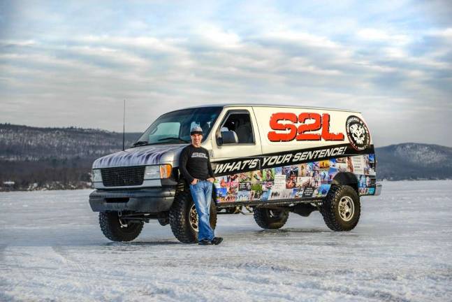 Greg Muniz is seen here with the S2L van on Greenwood Lake during a recent photo shoot.