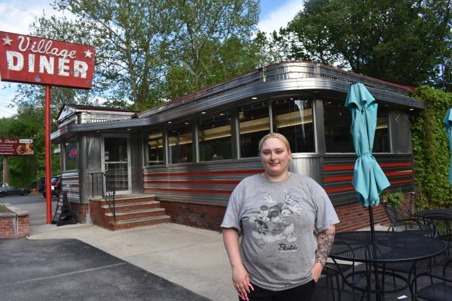 Summer Williamson Nocar, of Port Jervis, whose grandmother brought her home from the hospital 22 years ago, on a break from her job in Milford as a cook.