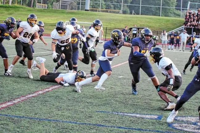 Jefferson ball carrier Braedan Cummings finds some running room in a game against West Milford last fall. (File photo by George Leroy Hunter)