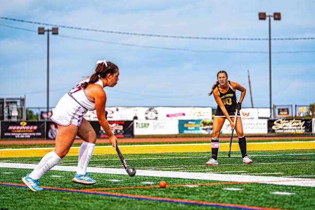 Senior Ava Scrimenti watches a Pompton Lakes player.