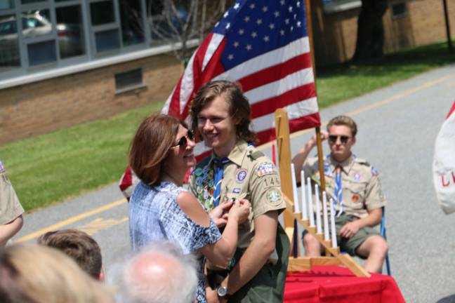 A proud mom, Lisa Kerssen congratulates her son.