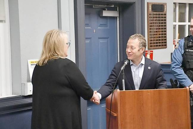West Milford Mayor Michele Dale shakes hands with Rep. Josh Gottheimer, D-5.
