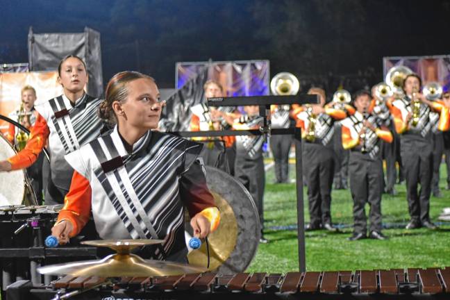 Sophomore Skylar Dempsey, front, at the band performs.