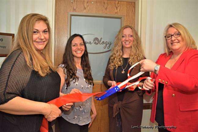 Mayor Michele Dale, far right, joins SpaOlogy owners Alessandra Hernandez, Stacy Van Dyk, and Waria Chard during the business's grand opening in April. Submitted photo