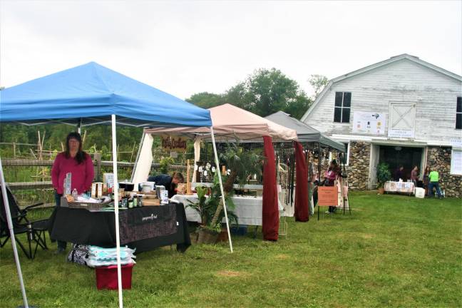 [Craft vendors displayed their wares during the first Wallisch Homestead Music Festival on saturday. Charles Kim photo]