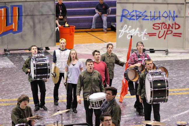 The 2017 Indoor Percussion group portray the show&#x2019;s theme: Uprising.