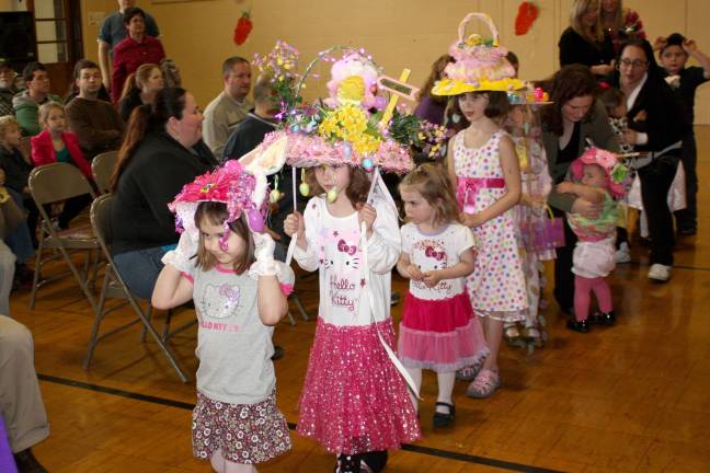 Hold onto your hats - it's the bonnet parade in motion.