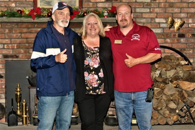 Republican primary winners Warren Gross, Mayor Michele Dale, and Kevin Goodsir celebrate their slate's resounding victory Tuesday night. Charles Kim photo