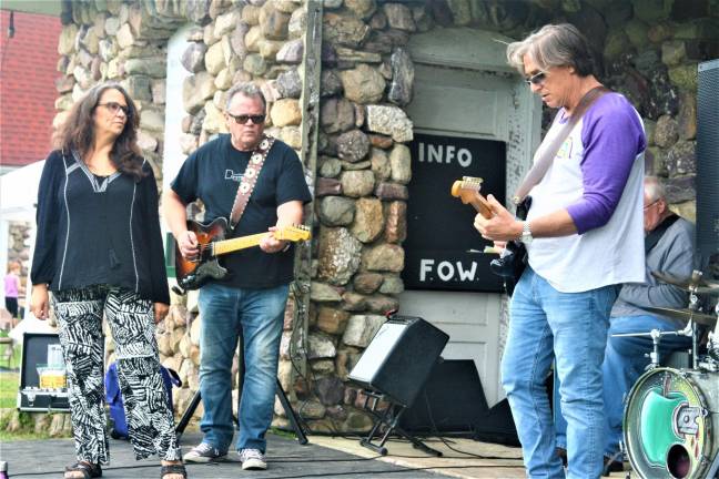[The Zeke Carey Band plays during the first Wallisch Homestead Music Festival. Charles Kim photo]