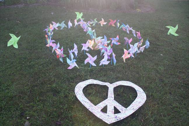 Students make pinwheels for whirled peace