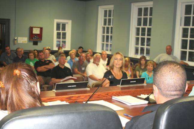 The revaluation of properties throughout the town caused lakefront homeowners and business owners, whose taxes skyrocketed, to pack many council meetings, pleading for relief. Photo by Linda Smith Hancharick