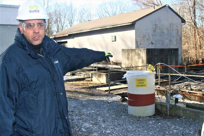 Charles Kim photo Suez officials tour a wastewater facility on Macopin Road after taking over operations of the Municipal Utilities Authority Tuesday.