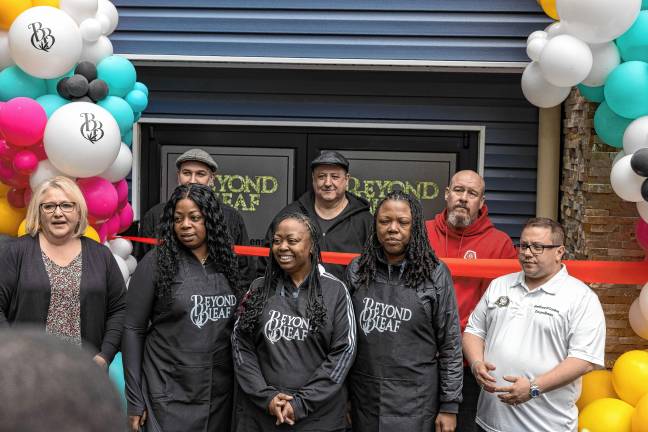 DI1 The co-owners of Beyond Bleaf, a Black women-owned cannabis dispensary, pose with West Milford officials at the grand opening May 24. (Photos provided)
