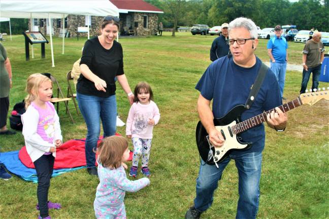 [Music filled the air Saturday at the Wallisch Homestead Music Festival. Charles Kim photo]