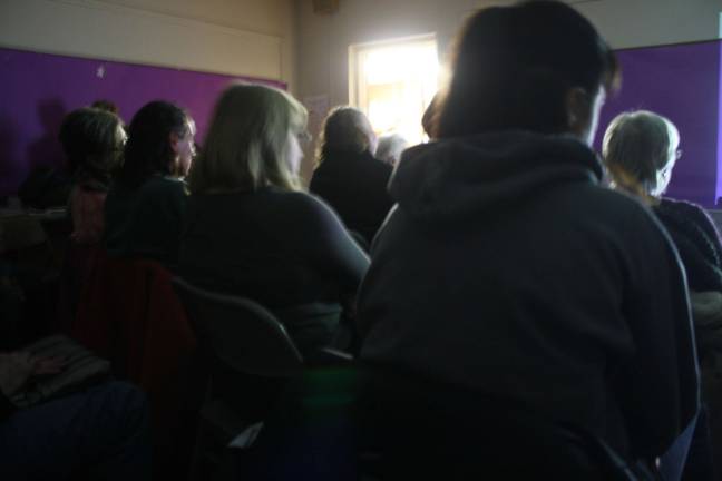 The room overflowed as more than 60 people showed up for the screening.