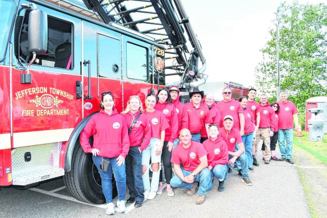 Jefferson Township Fire Depts. 1 and 2 pose for a photo.