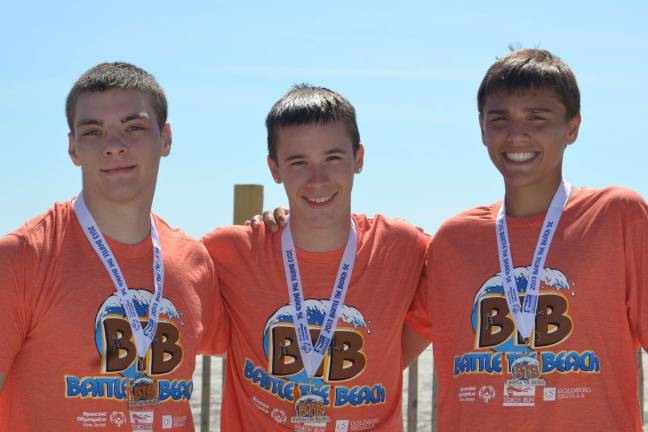 From left, Matt Majewski, Dakota McAveney and Blake Ballin - all West Milford residents and employees at Town Tavern - competed in Battle the Beach Charity 5K in Wildwood. They finished first, second and fourth out of 751 athletes and raised $300 for Special Olympics of New Jersey.