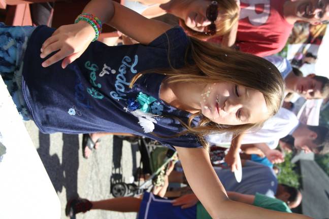 Molly Sabo of Long Valley is the winner of the corn eating contest.