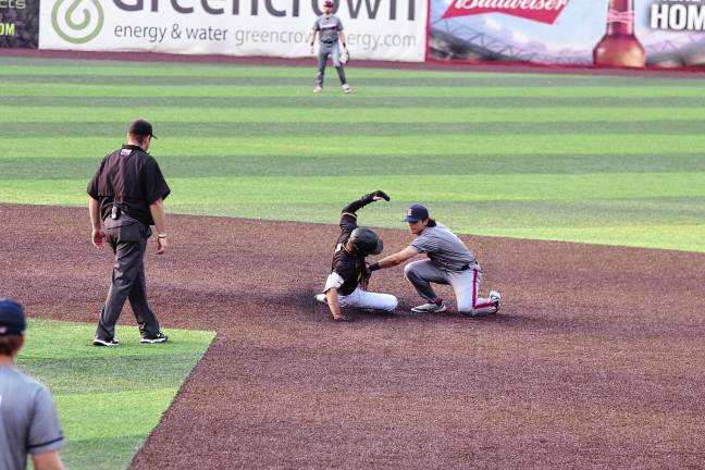 <b>Miners runner Hunter D'Amato is tagged out at second base by Rox infielder J.R. DiSarcina in the second inning. </b>
