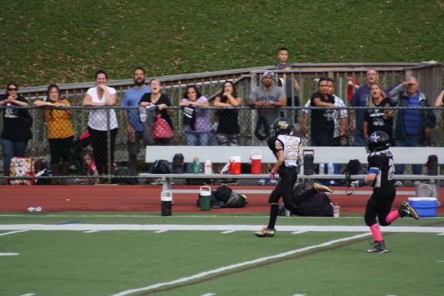 Danny Platt (#28) scores an 80-yard touchdown for The Super Team. photo provided