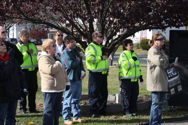 The crowd pledged allegience to the flag and then honored those who served our country.