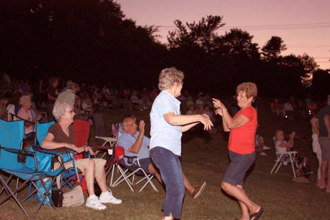 While the sun is setting, these ladies got in a few more dances on the grass.