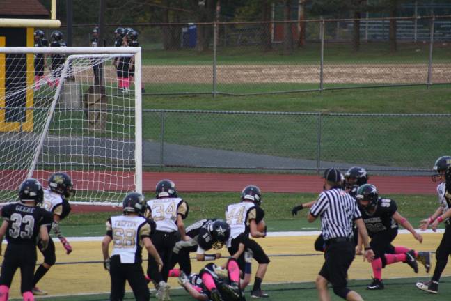Jake Kelshaw (#44) runs a 4-yard touchdown for The Super Team. photo provided